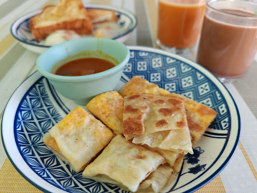 Roti Canai depan Klinik Kesihatan Air Hangat Roti Canai depan Klinik Kesihatan Air Hangat